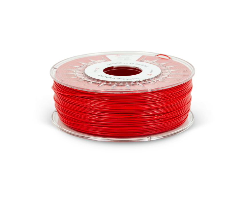Red ABS filament on a spool